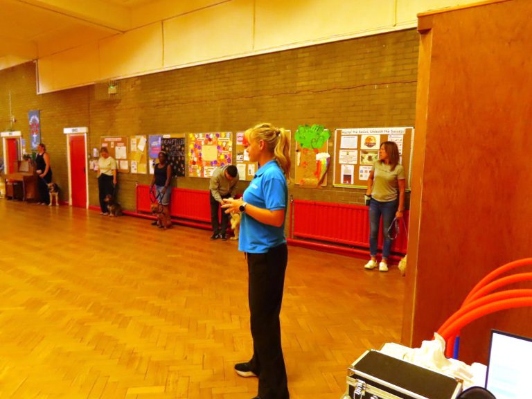 A trainer talking the class through an exercise